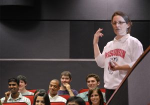 Wendy Crone speaking in auditorium